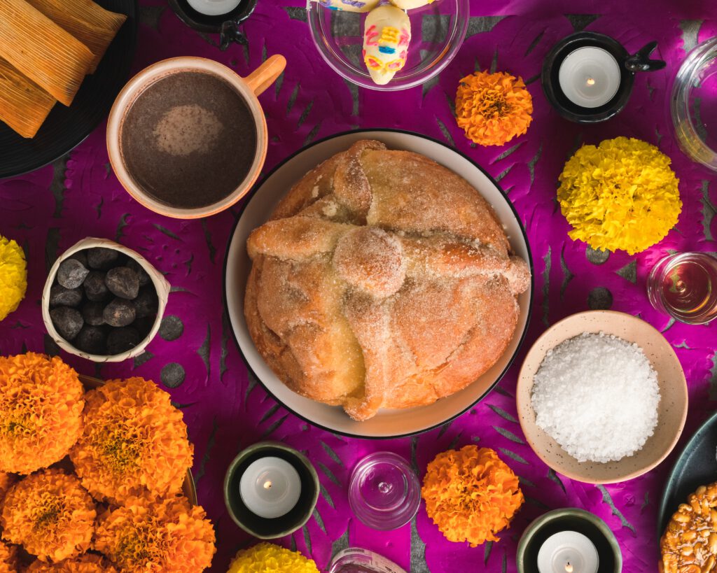 pan de muertos and marigold flowers for Day of the Dead in Oaxaca Mexico